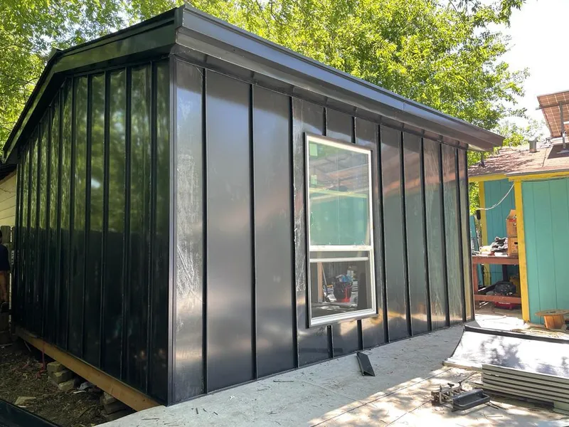 Black standing seam metal wall panels for Roof Inspection in Thomasville